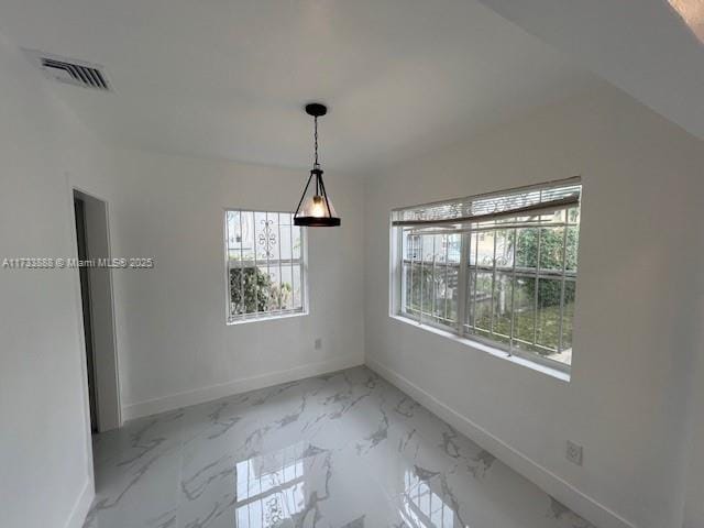 view of unfurnished dining area