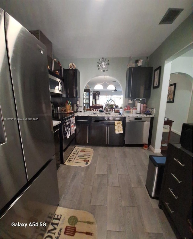 kitchen featuring stainless steel appliances and sink