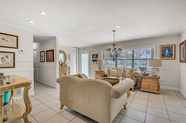 living room with ornamental molding, light tile patterned flooring, a notable chandelier, and a textured ceiling