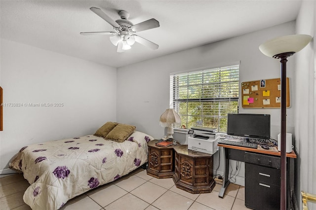 bedroom with light tile patterned floors and a ceiling fan