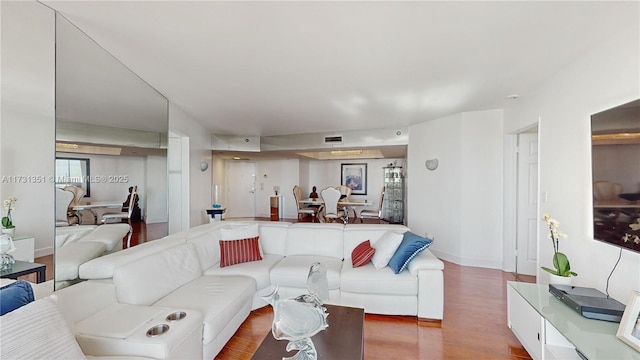 living room with hardwood / wood-style flooring