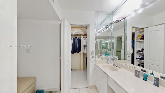 bathroom with vanity and tile patterned floors