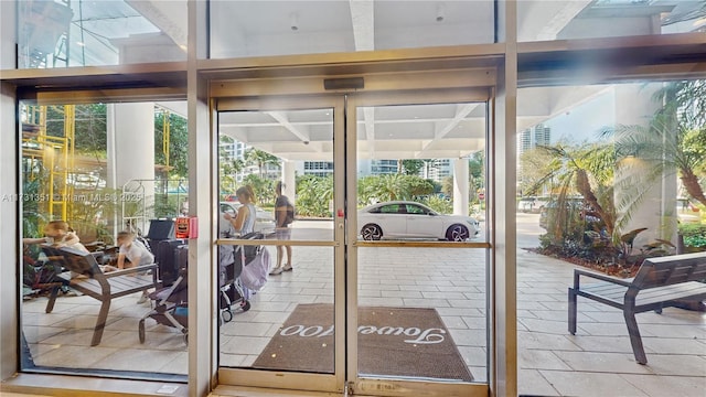 entryway with a wall of windows