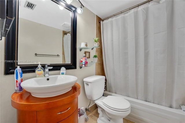 full bathroom featuring shower / bathtub combination with curtain, vanity, and toilet