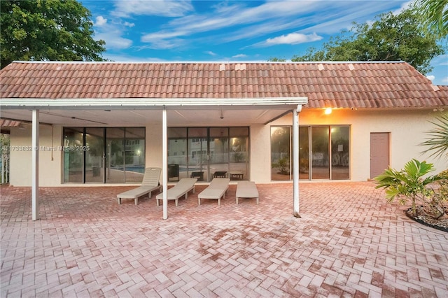 rear view of property with a patio area