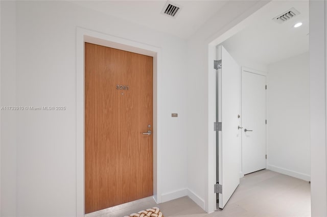 doorway to property featuring visible vents