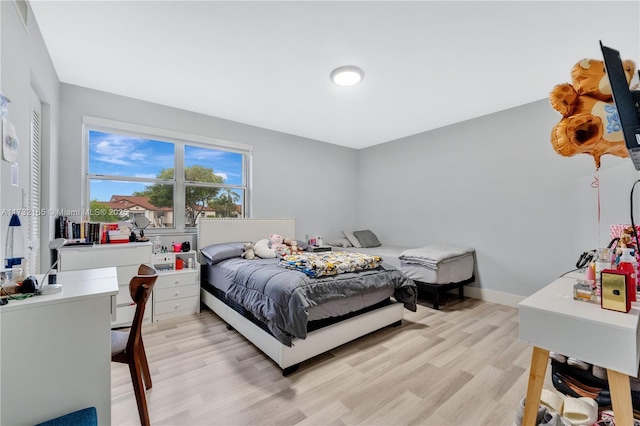 bedroom featuring light hardwood / wood-style flooring