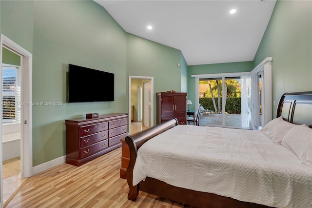 bedroom featuring high vaulted ceiling, access to outside, and light hardwood / wood-style floors