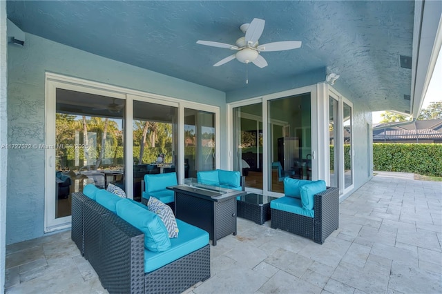 view of patio / terrace with ceiling fan and outdoor lounge area