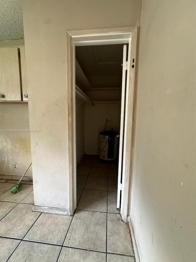 hallway featuring light tile patterned flooring