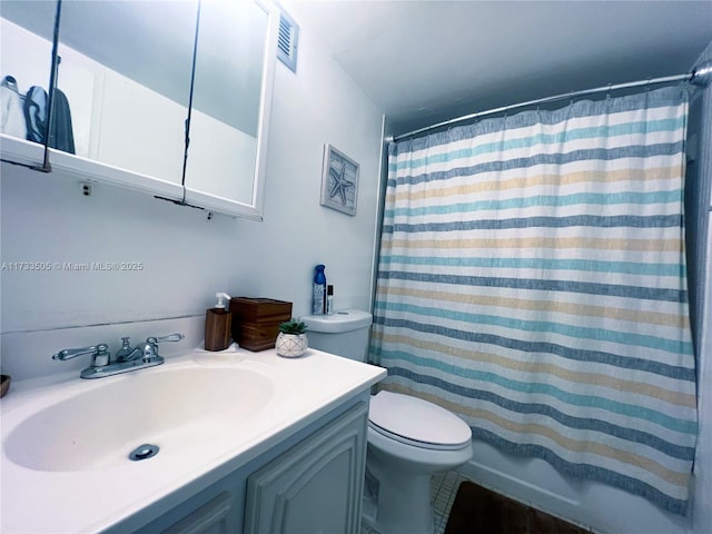 full bathroom featuring vanity, toilet, and shower / bath combo with shower curtain