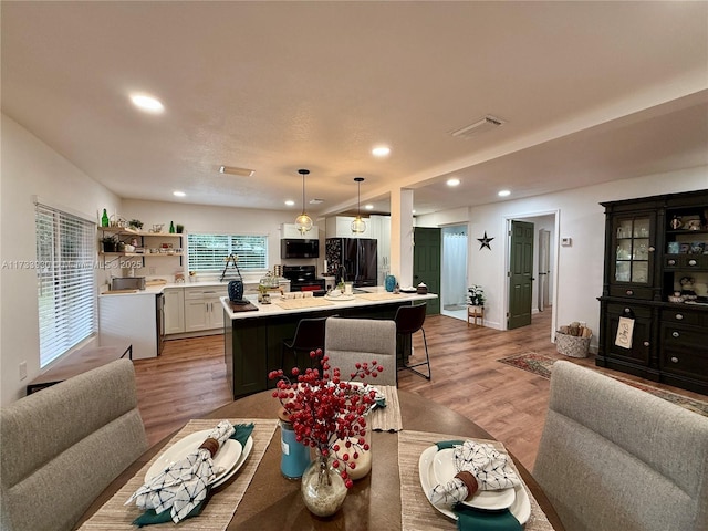 living room with light hardwood / wood-style floors