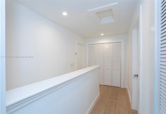 corridor featuring light hardwood / wood-style floors