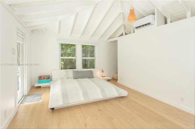 bedroom featuring a wall mounted air conditioner, hardwood / wood-style floors, and vaulted ceiling with beams