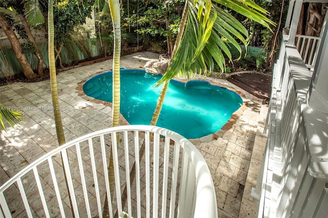 view of swimming pool featuring a patio