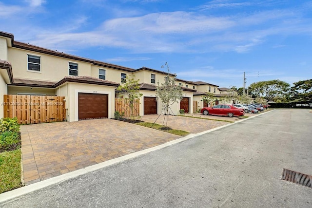 view of front of property featuring a garage