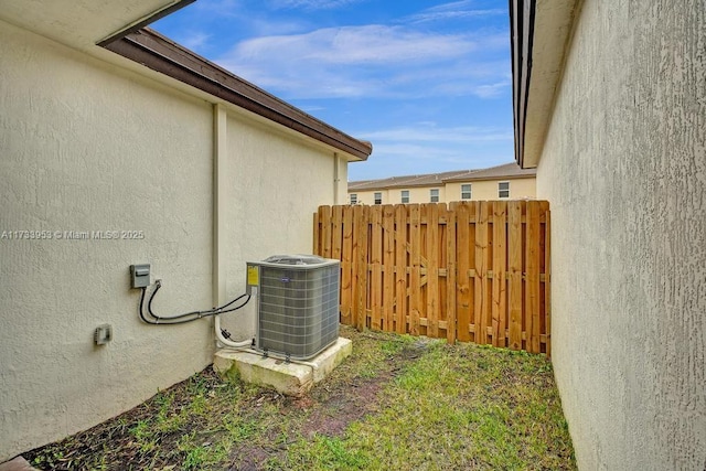 view of yard with central AC