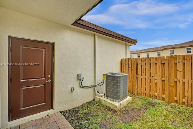 property entrance with cooling unit