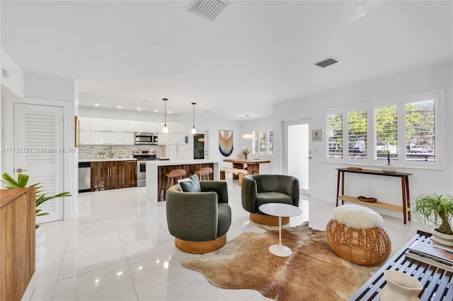 living room with sink