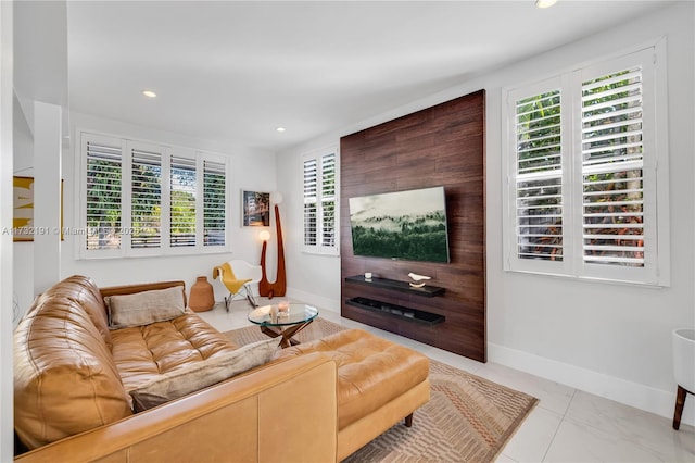 living room featuring light tile patterned flooring