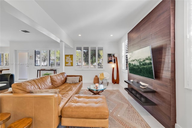 living room with light tile patterned floors