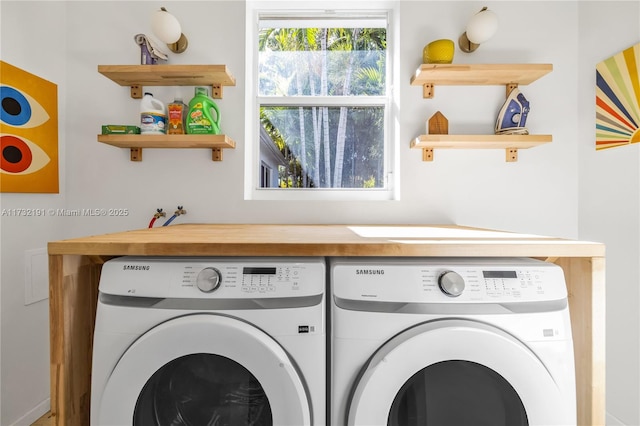 laundry area featuring independent washer and dryer