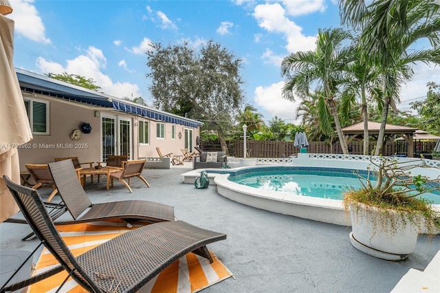 view of swimming pool with a gazebo