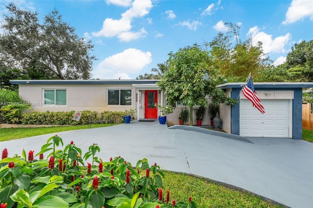 ranch-style house featuring a garage