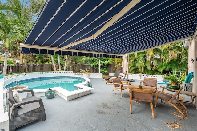 view of pool featuring a patio area