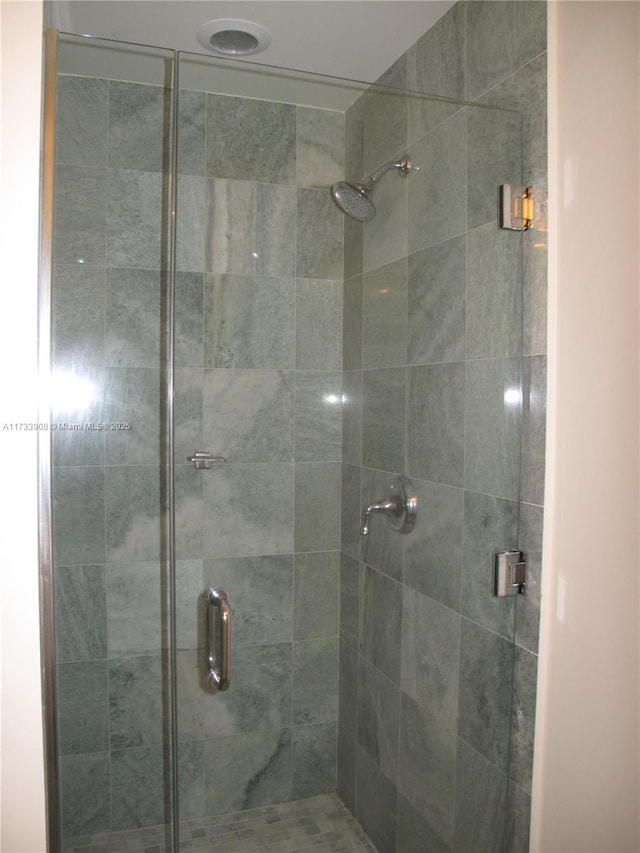 bathroom featuring walk in shower