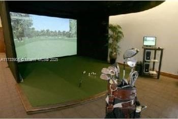 game room featuring golf simulator