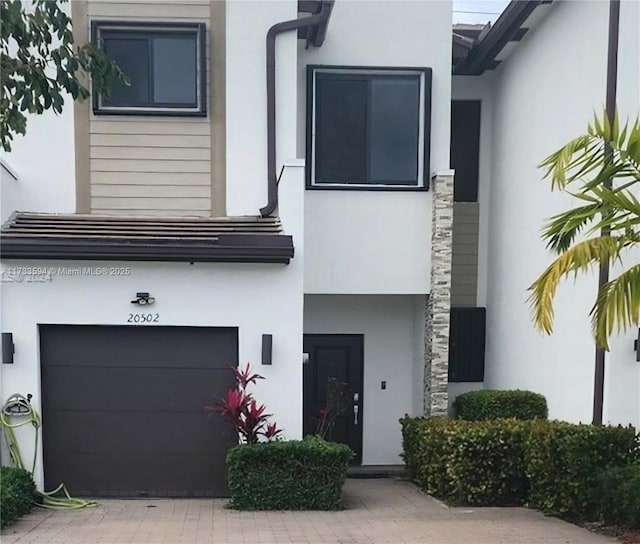 view of front of home featuring a garage