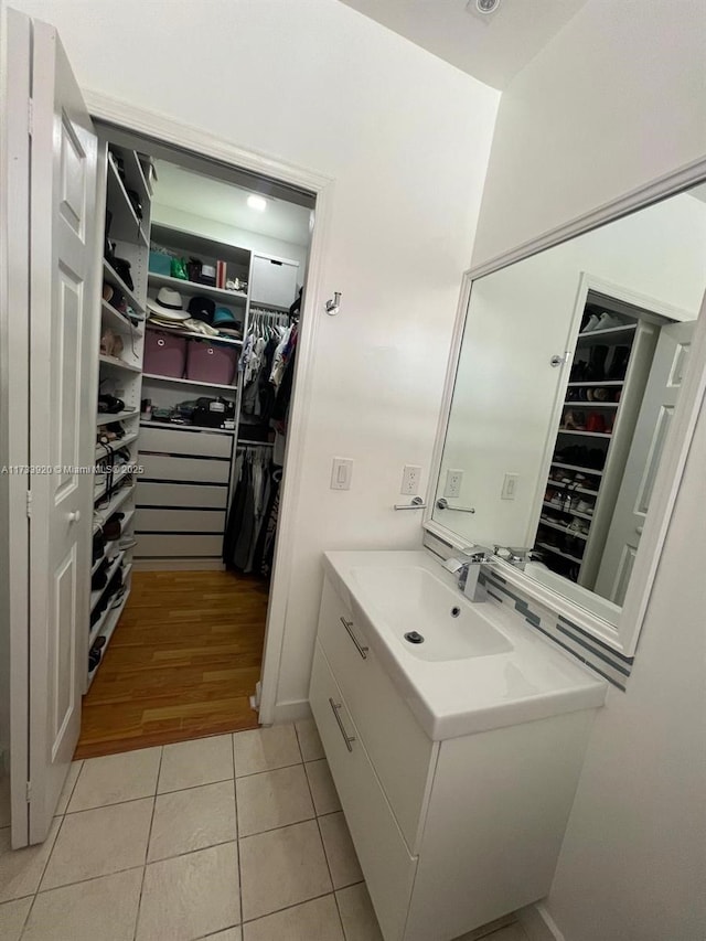 bathroom with vanity and tile patterned floors