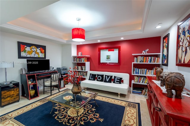 living room featuring a raised ceiling