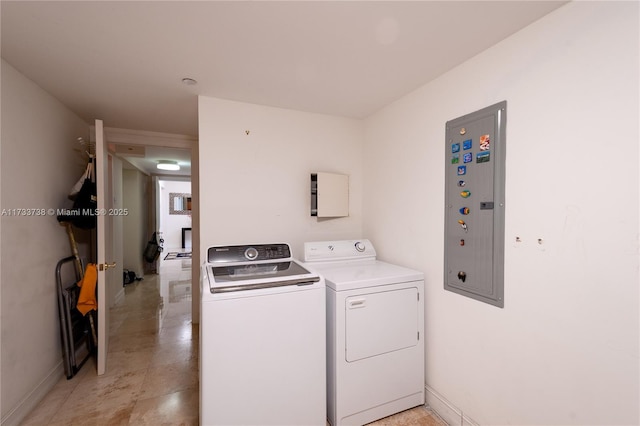 clothes washing area featuring washing machine and clothes dryer