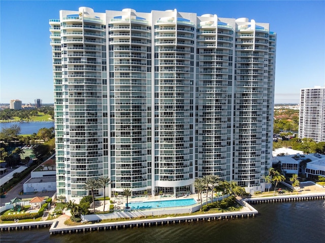 view of building exterior with a water view