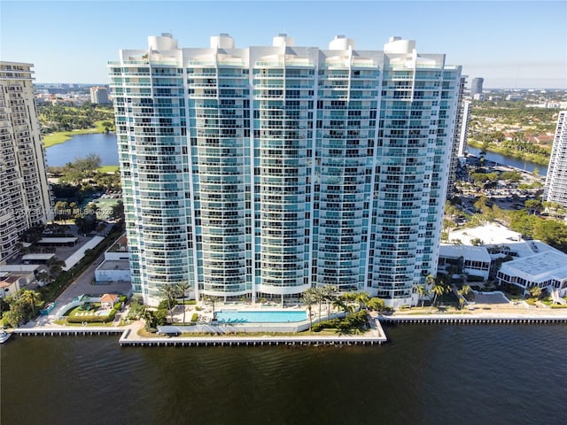 view of building exterior with a water view