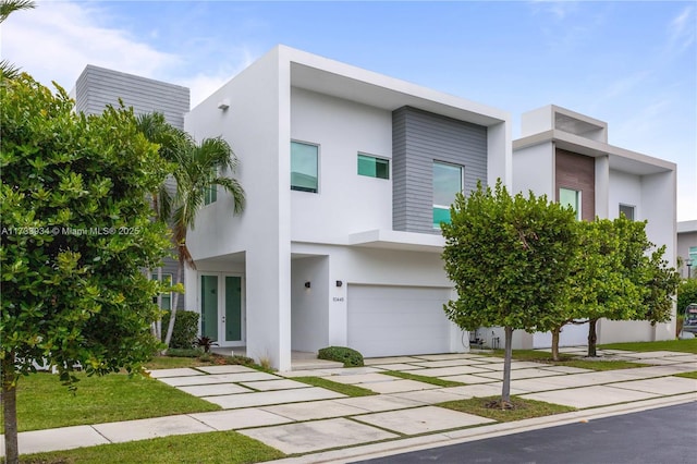 modern home featuring a garage