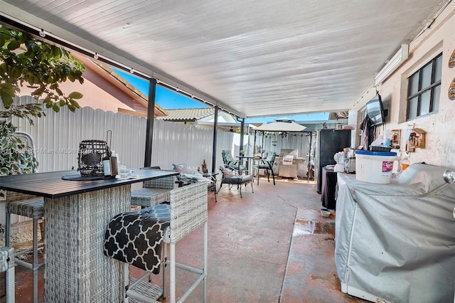 view of patio / terrace with a bar