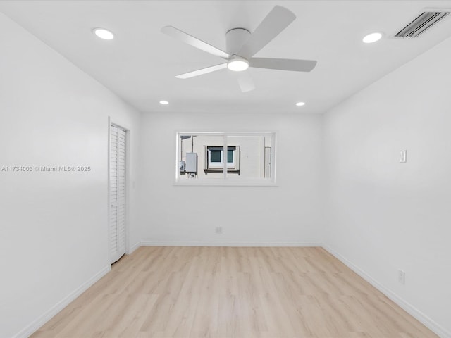 unfurnished room with light hardwood / wood-style flooring and ceiling fan