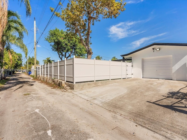 view of home's exterior with a garage