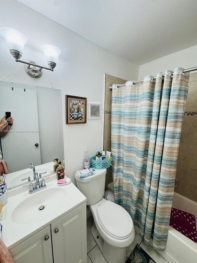 full bathroom featuring shower / bathtub combination with curtain, vanity, tile patterned flooring, and toilet