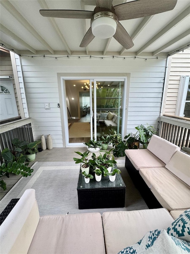 exterior space with an outdoor hangout area and ceiling fan