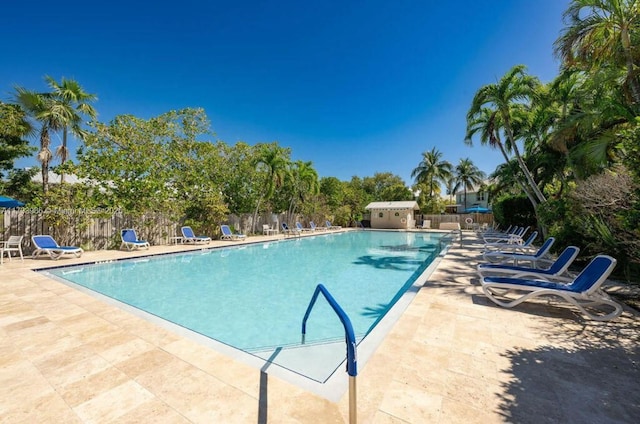 view of swimming pool with a patio area