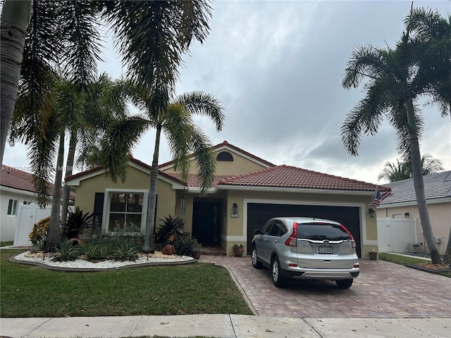 view of front of property with a garage