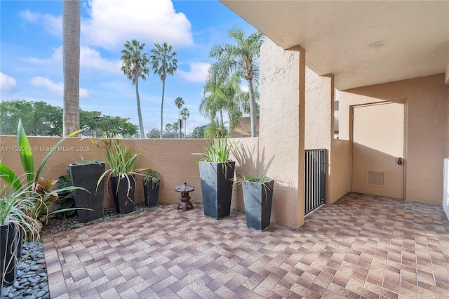 view of patio with a balcony