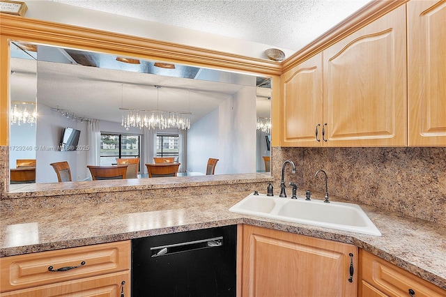 kitchen with sink, hanging light fixtures, black dishwasher, light brown cabinetry, and a chandelier