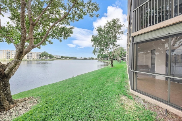 view of yard with a water view