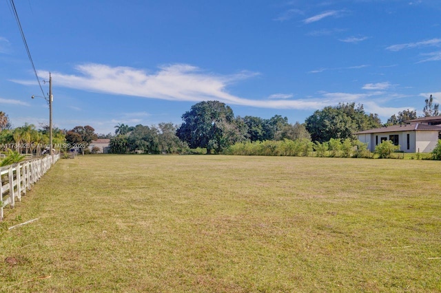 view of yard with fence