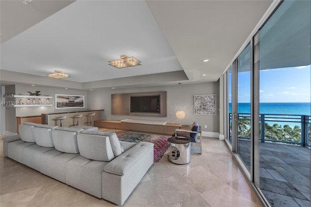 living room with floor to ceiling windows